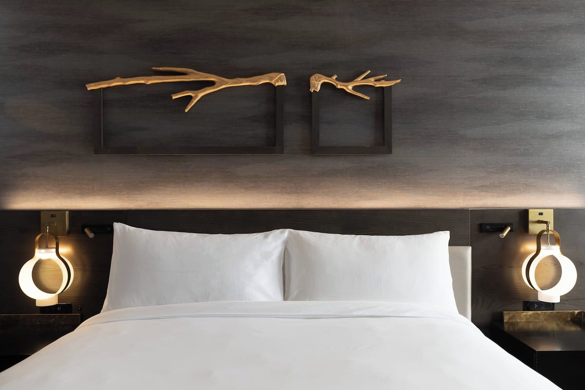 Down comforters, pillowtop beds, in-room safe, desk