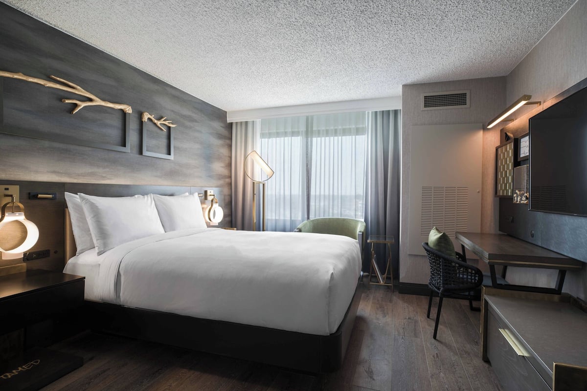 Down comforters, pillowtop beds, in-room safe, desk