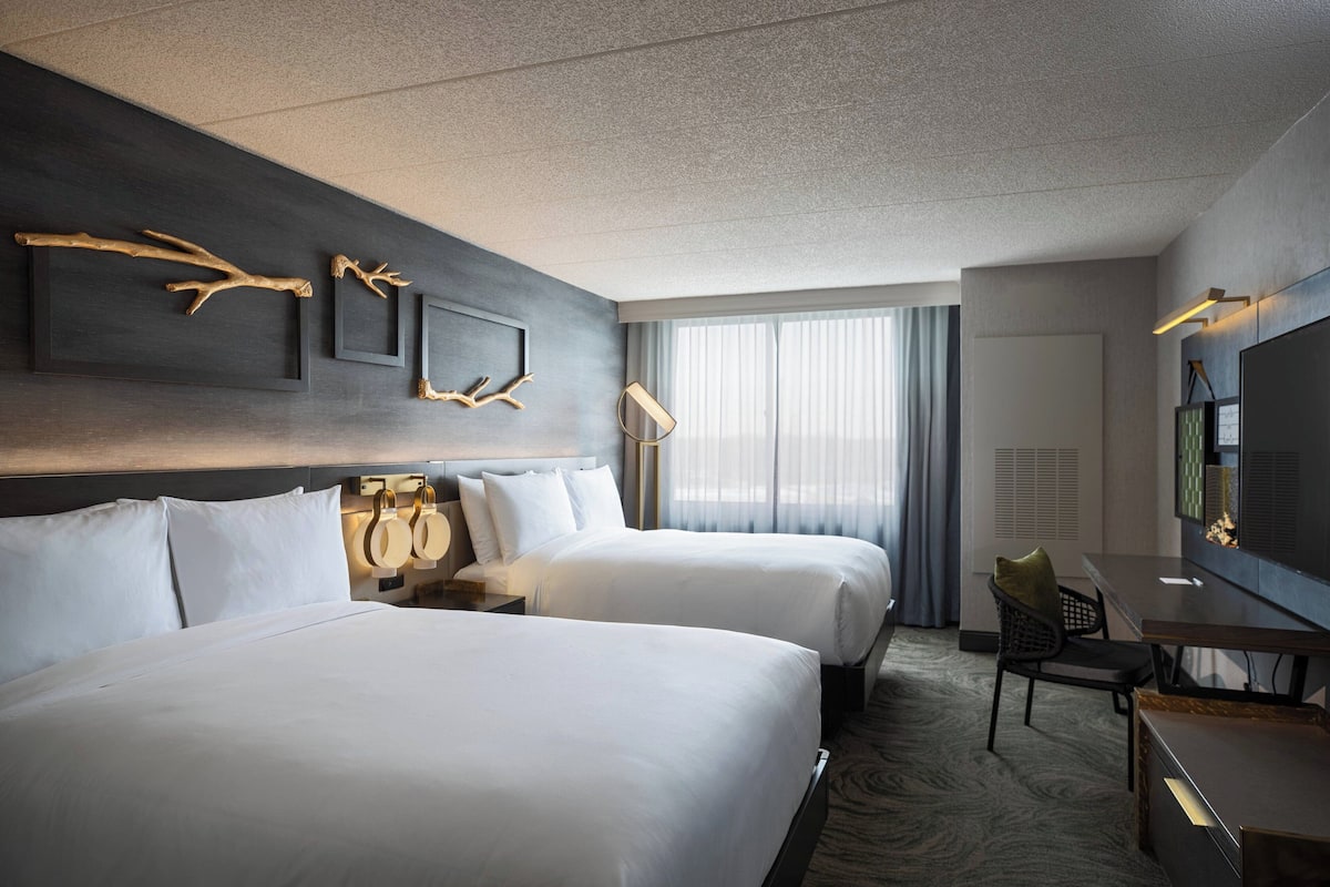 Down comforters, pillowtop beds, in-room safe, desk