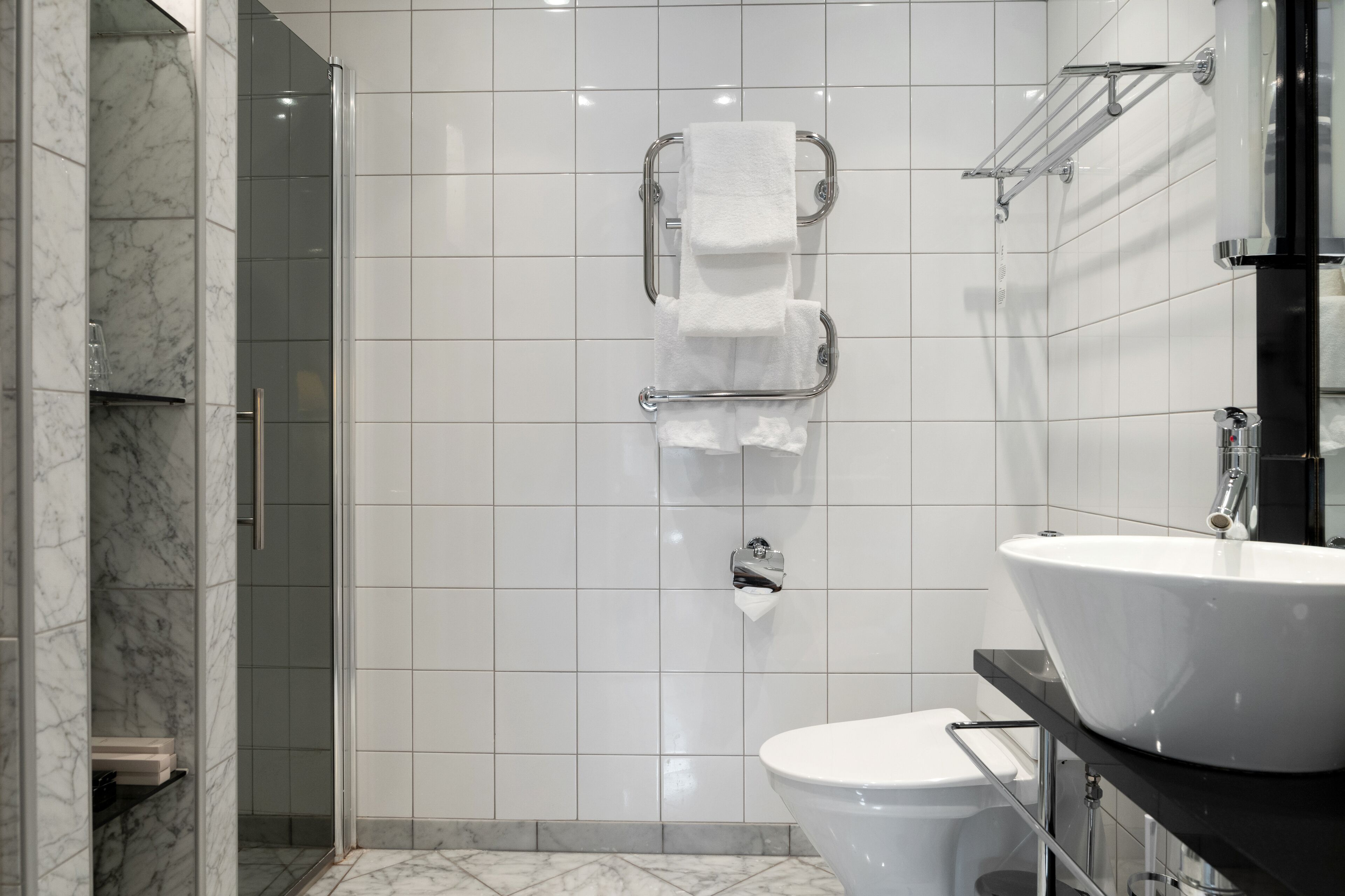 deluxe room | bathroom | eco-friendly toiletries, hair dryer, towels