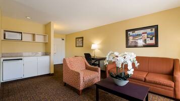 Desk, laptop workspace, iron/ironing board, cribs/infant beds