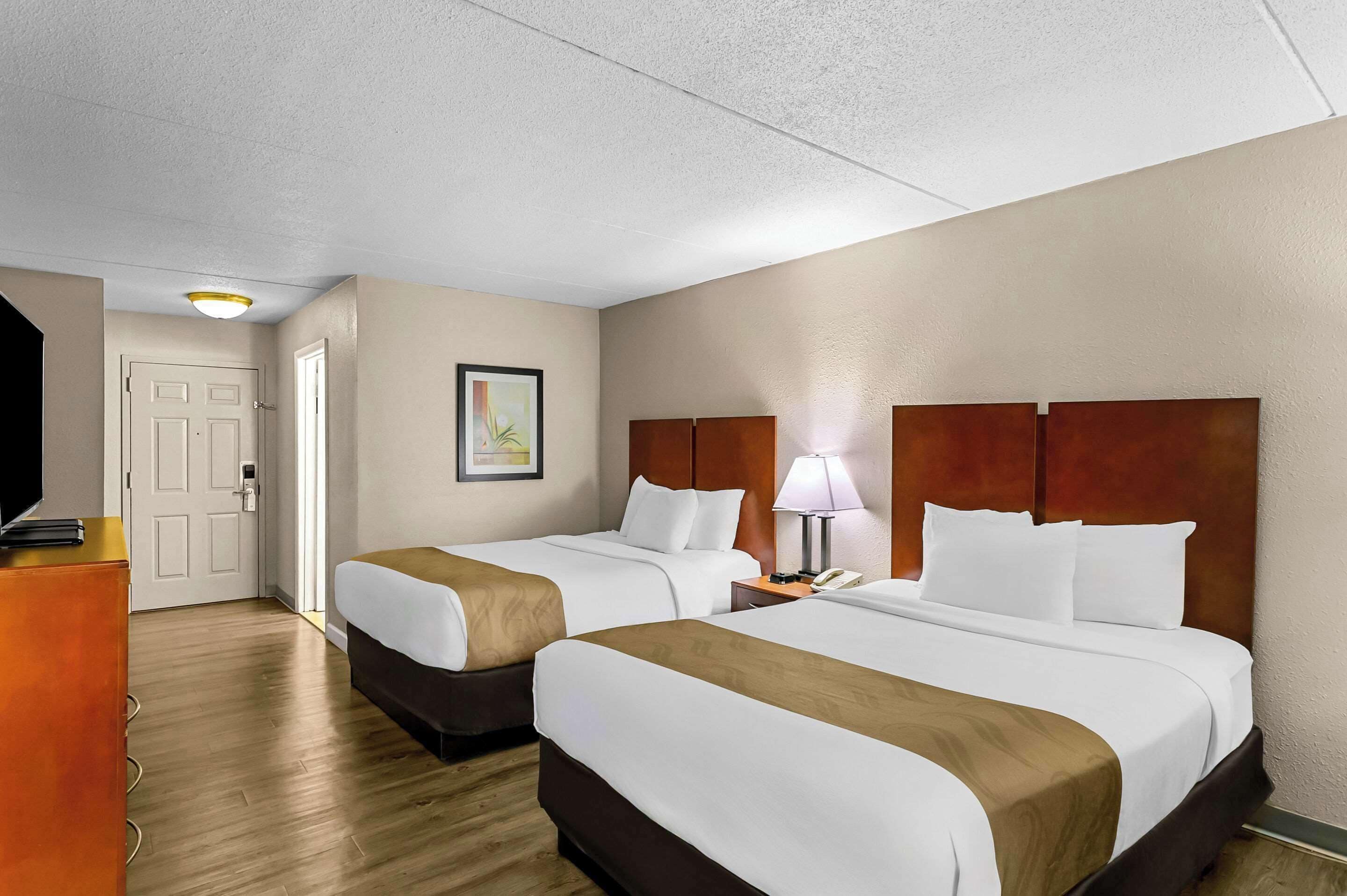 Desk, laptop workspace, blackout curtains, iron/ironing board