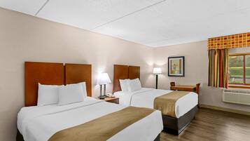 Desk, laptop workspace, blackout drapes, iron/ironing board