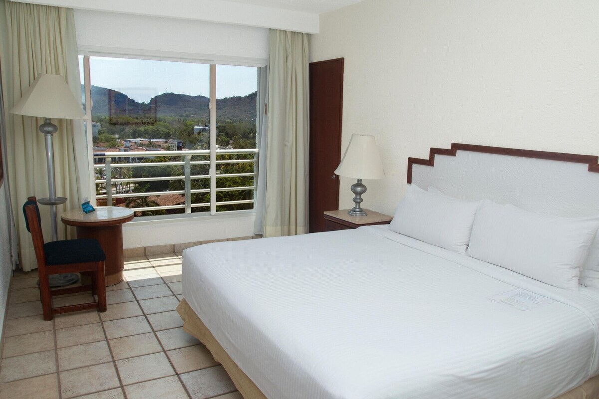 In-room safe, desk, laptop workspace, iron/ironing board