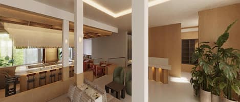 Un interior moderno con una zona de bar, asientos y una planta grande.