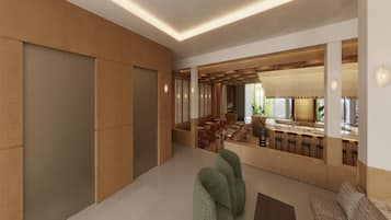 Een modern interieur met een zithoek, een bar en een eethoek.