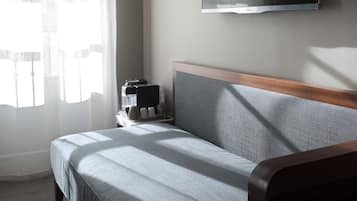 Habitaciones adyacentes, sin comunicacion | Ropa de cama de alta calidad y colchones con acolchado adicional