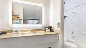 Standard Room, 2 Queen Beds, Non Smoking | Bathroom | Combined shower/tub, eco-friendly toiletries, hair dryer, towels