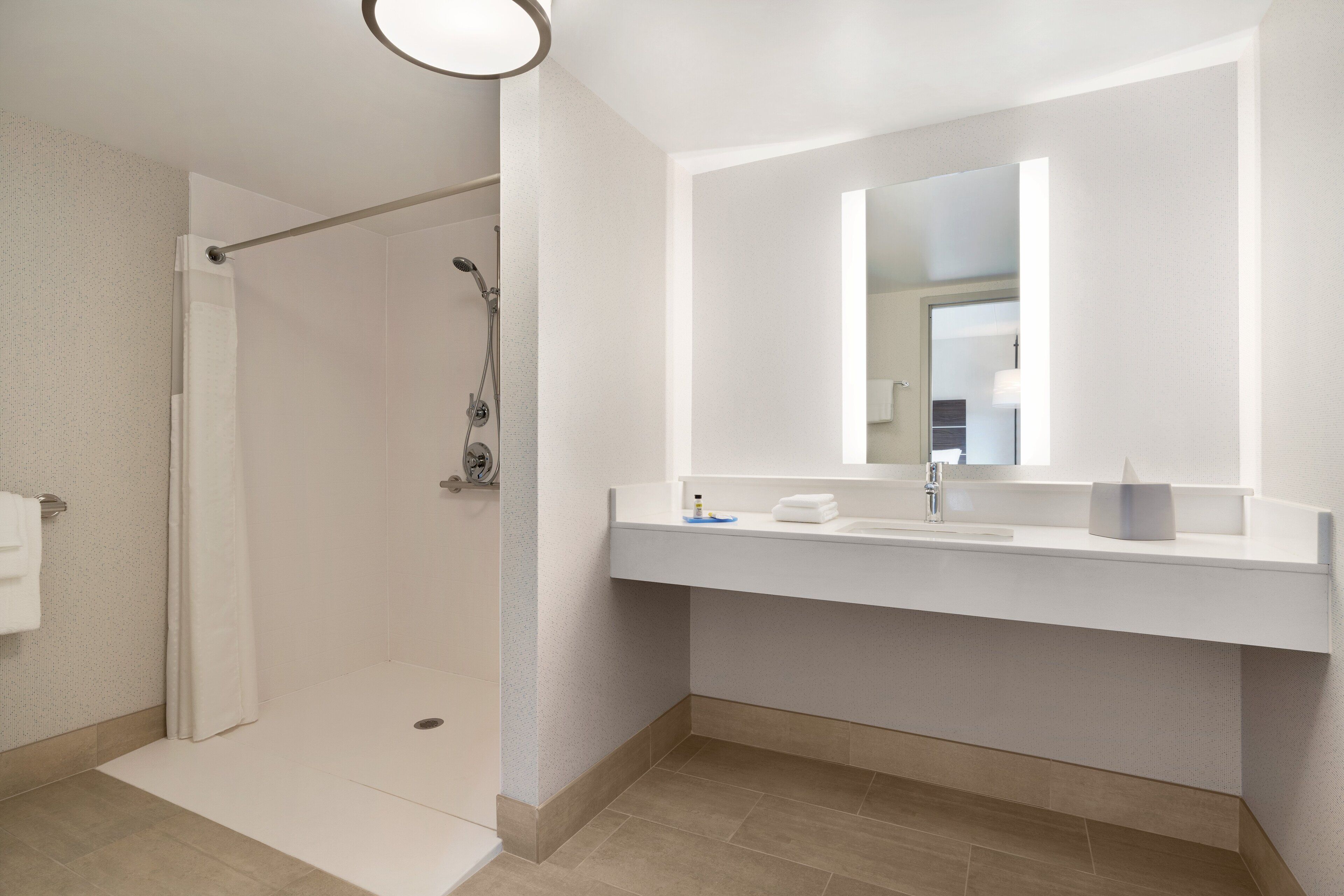 combined shower/bathtub, free toiletries, hair dryer, towels