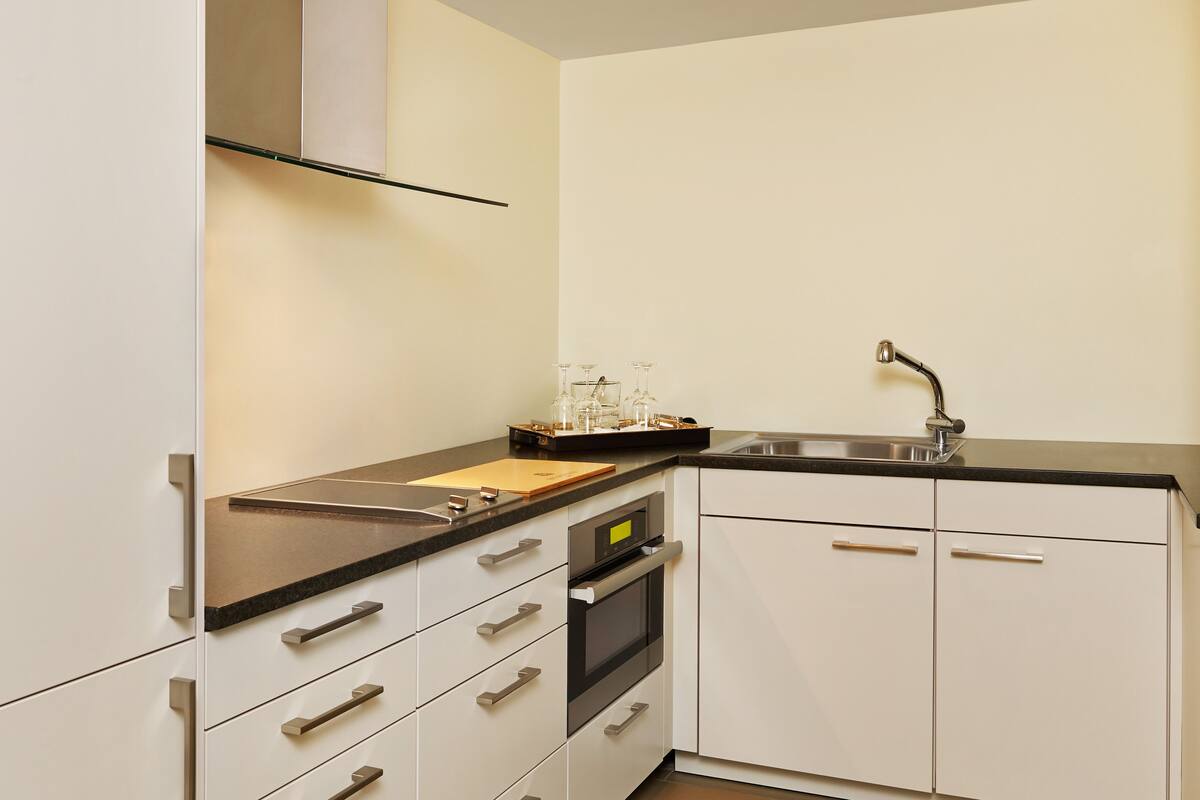 snow lodge presidential suite, 1 king bed | private kitchen | coffee/tea maker, eco-friendly cleaning products