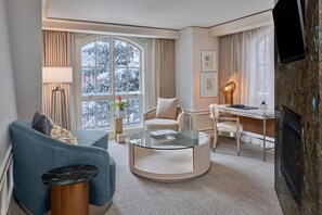 Suite, 2 Bedrooms, Fireplace | Living area | LCD TV, DVD player, books, pay movies