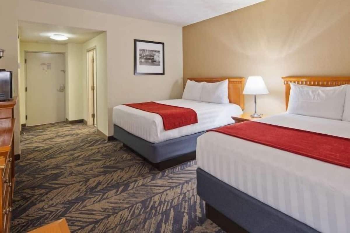Pillow-top beds, in-room safe, blackout curtains, iron/ironing board