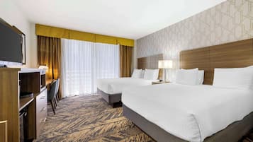 Pillow-top beds, in-room safe, blackout curtains, iron/ironing board