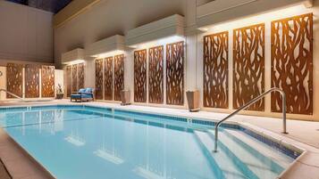 Outdoor pool, open 7:00 AM to 10:00 PM, pool loungers