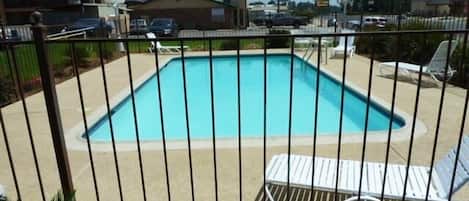 Seasonal outdoor pool, pool umbrellas, sun loungers