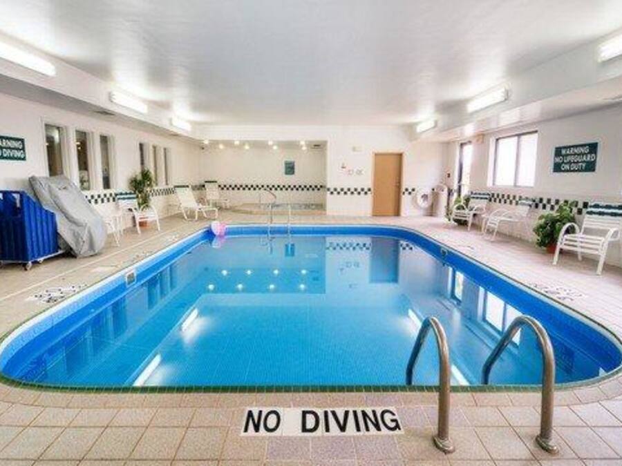 Indoor pool, open 9 AM to 10 PM, pool loungers