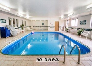 Indoor pool, open 9 AM to 10 PM, pool loungers