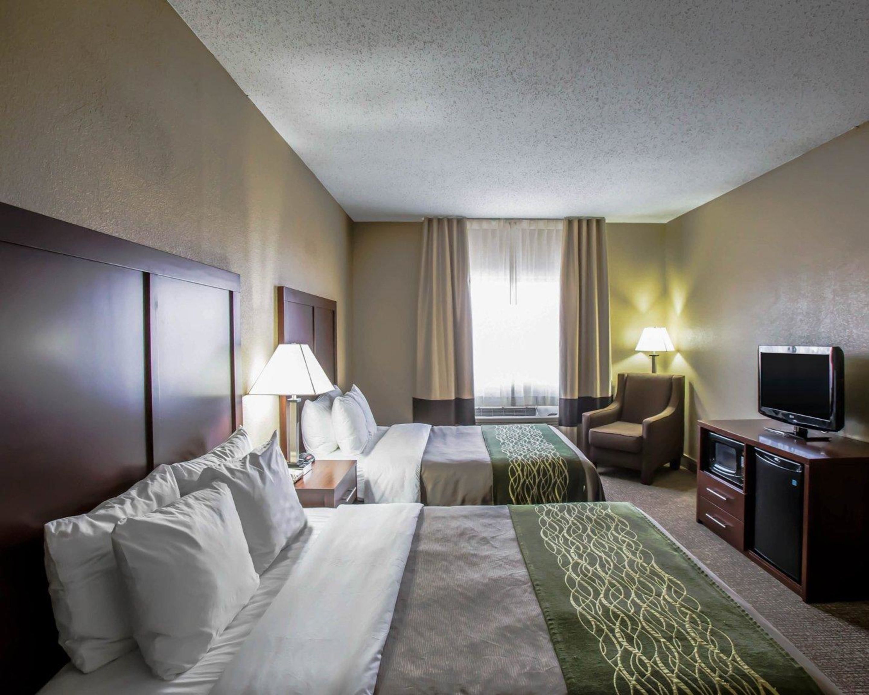 desk, blackout curtains, iron/ironing board, free cots/infant beds