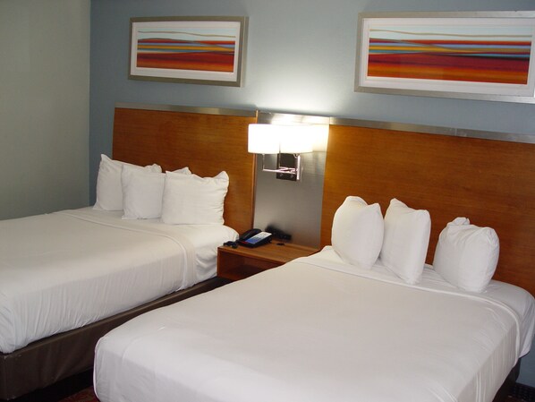 Two Queen Beds, Pool View, Non-Smoking | Premium bedding, pillow-top beds, individually decorated