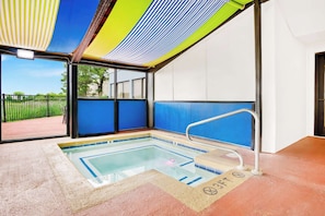 Relax by the pool with a clear view of the surrounding landscape.
