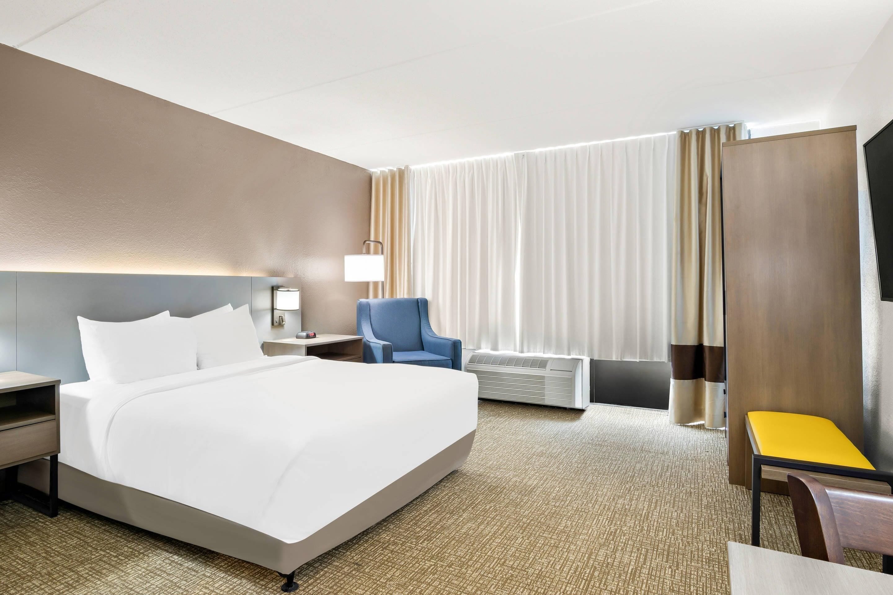 Camera, 1 letto queen, accessibile ai disabili, non fumatori | Tende oscuranti, ferro/asse da stiro, culle/letti per bambini (gratuiti)