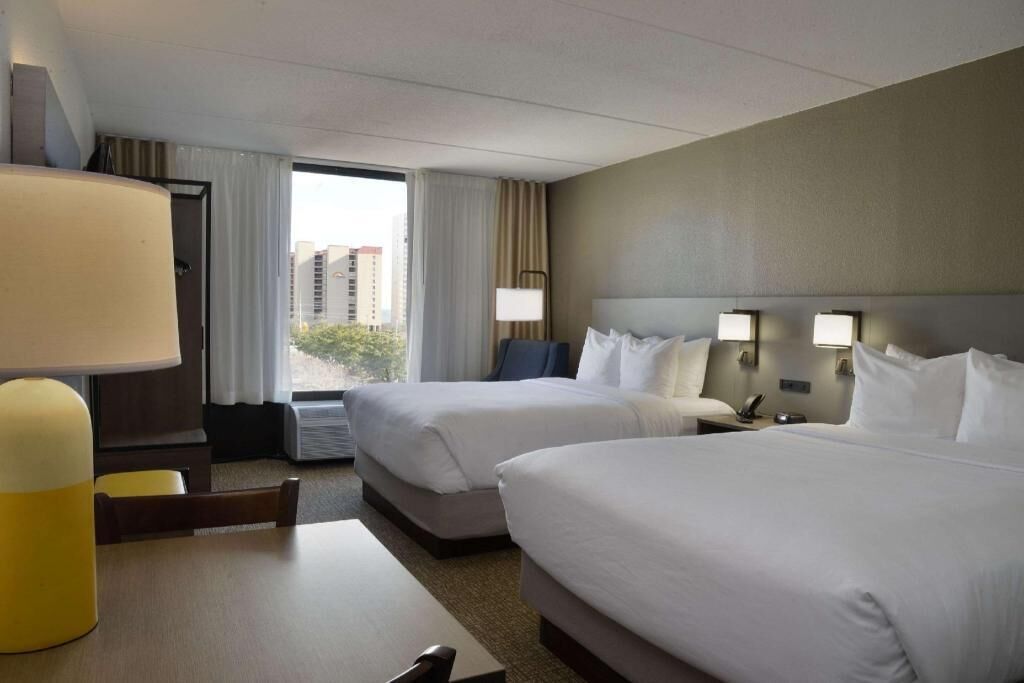 Blackout curtains, iron/ironing board, free cots/infant beds