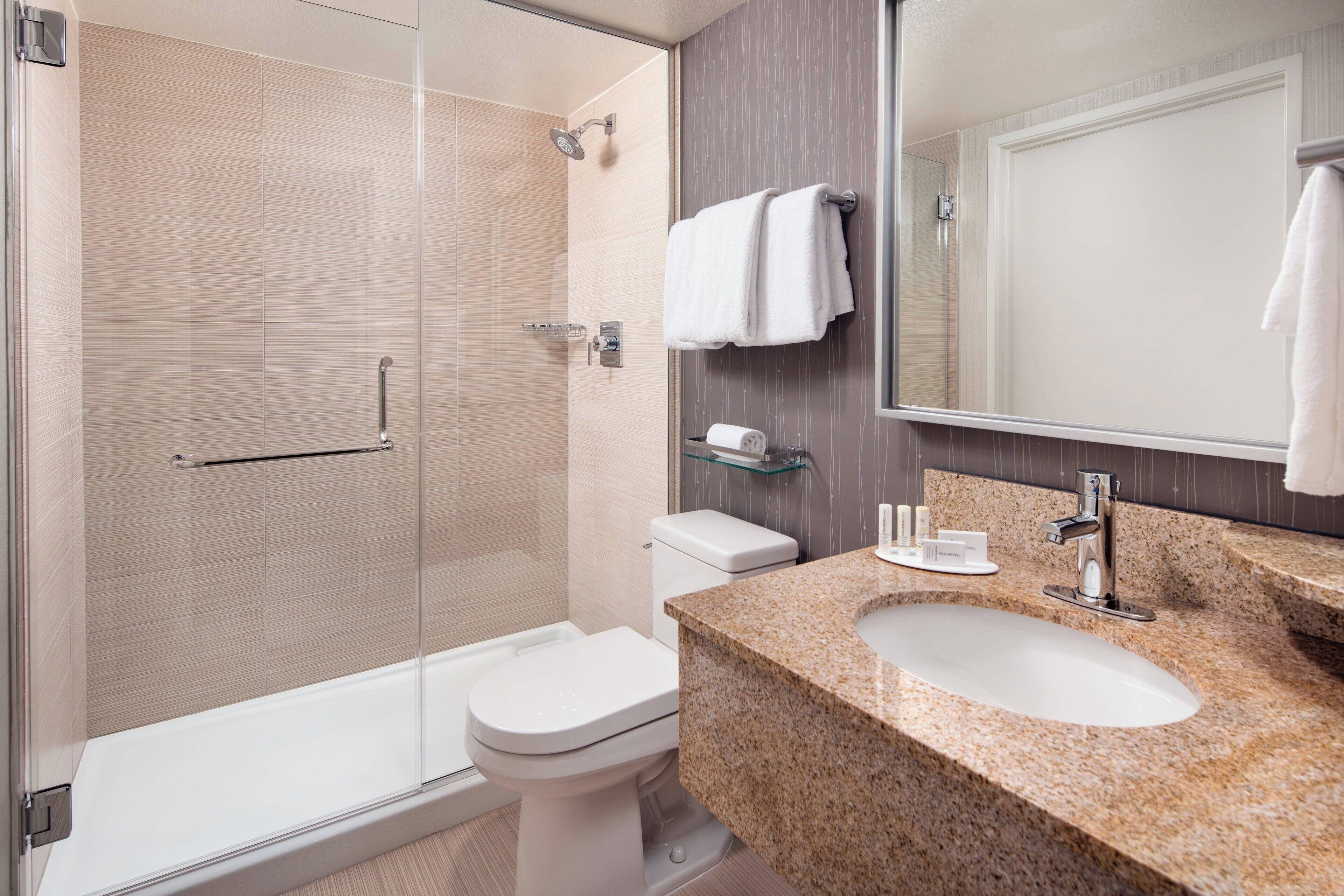 free toiletries, hair dryer, towels, toilet paper