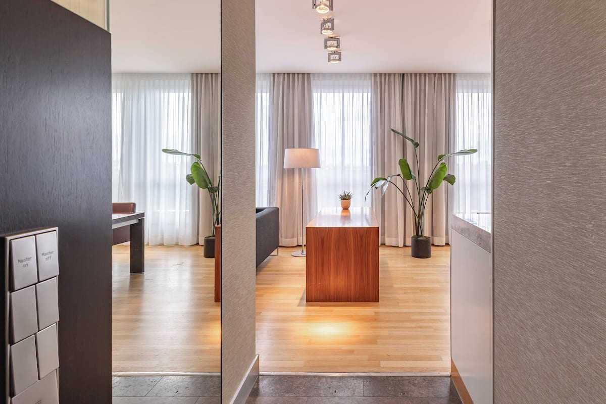 Suite, Corner | Minibar, in-room safe, desk, laptop workspace