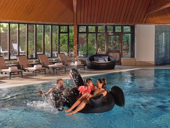 Indoor pool, open 7:00 AM to 9:00 PM, pool loungers