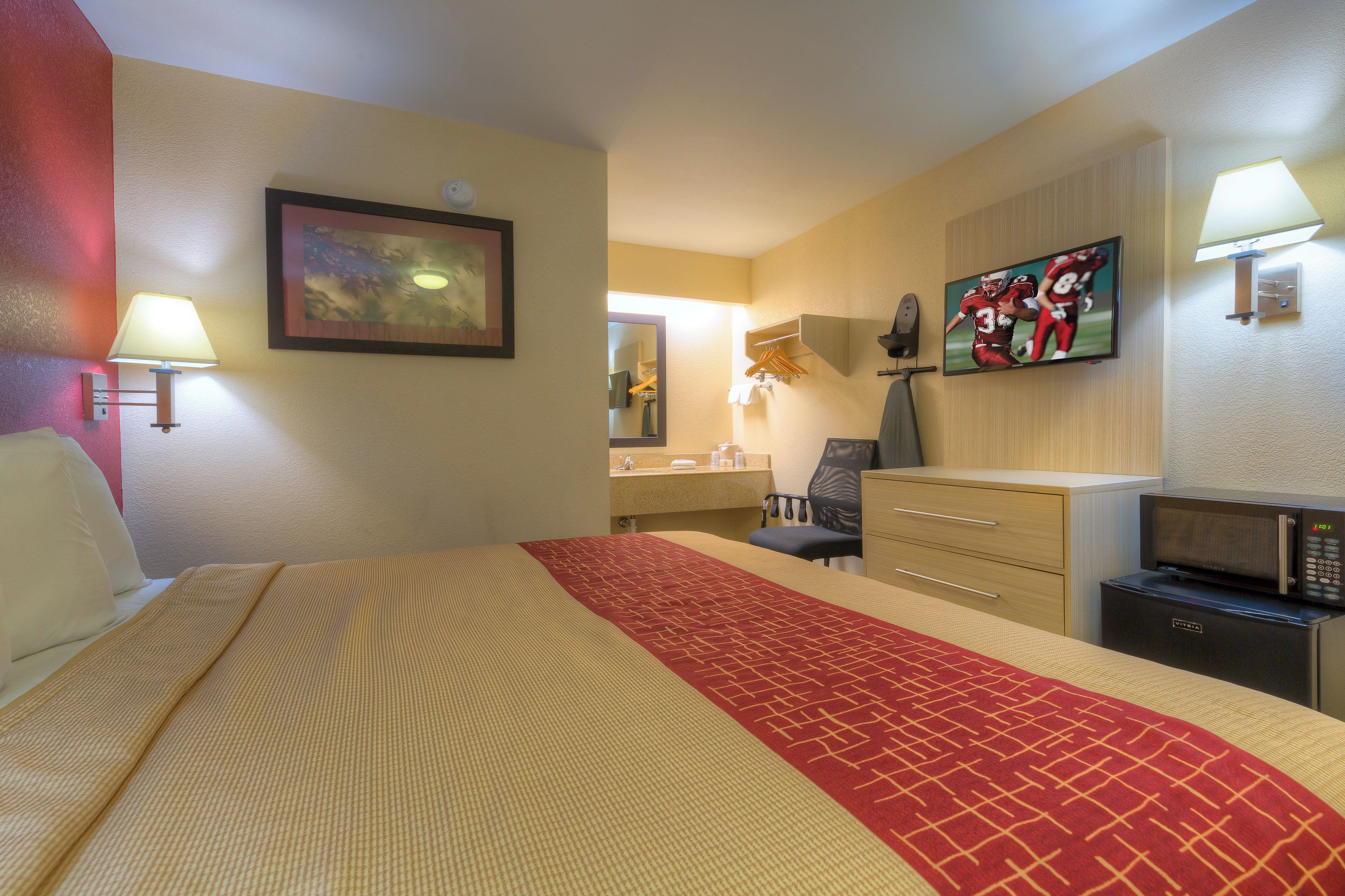 Blackout drapes, cribs (free), WiFi (free), bed sheets