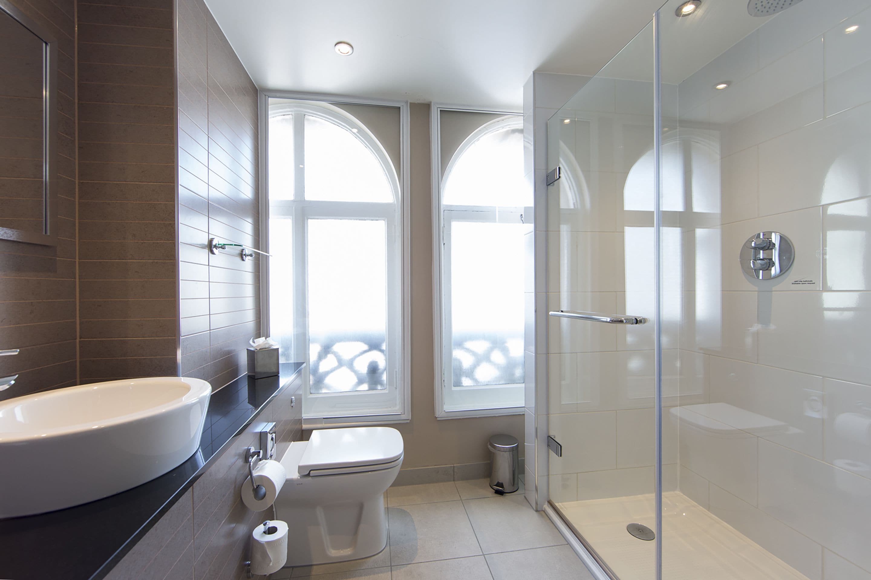 junior suite, 1 king bed with sofa bed | bathroom | shower, free toiletries, hair dryer, towels