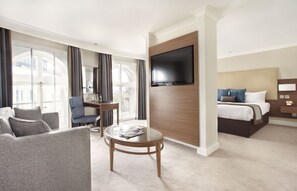 Junior Suite, 1 King Bed with Sofa bed | Living area | 48-inch Smart TV with digital channels