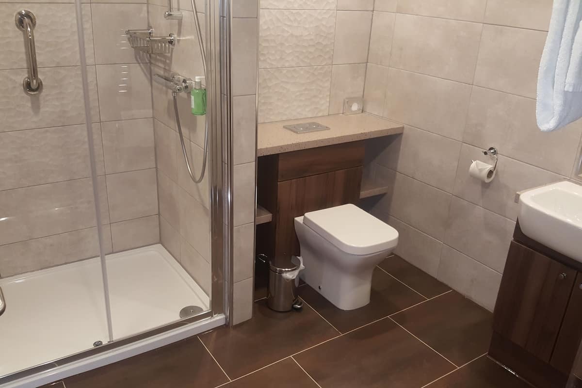 superior room, 1 king bed, non smoking | bathroom | free toiletries, hair dryer, towels, soap