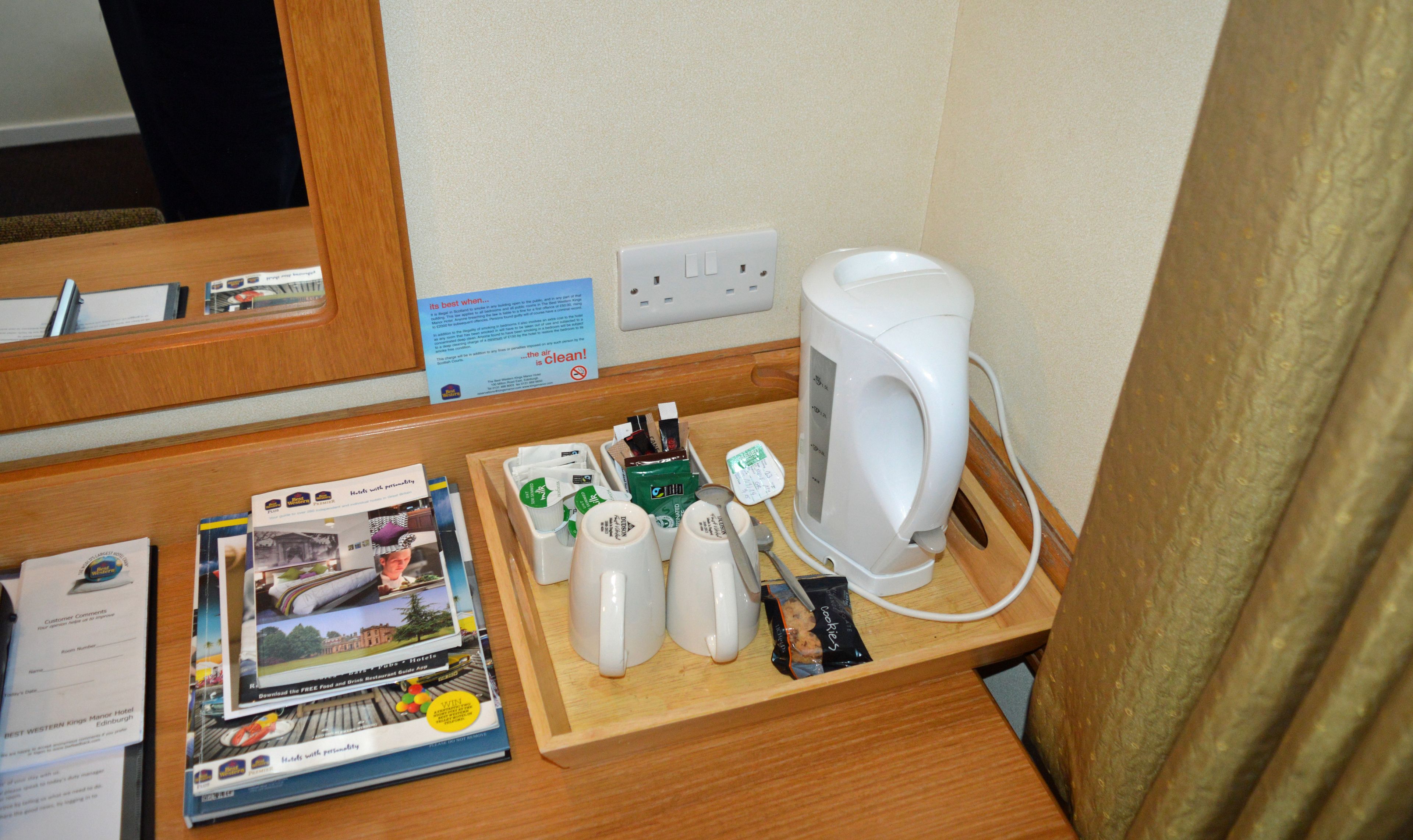 hypo-allergenic bedding, desk, laptop workspace, blackout curtains