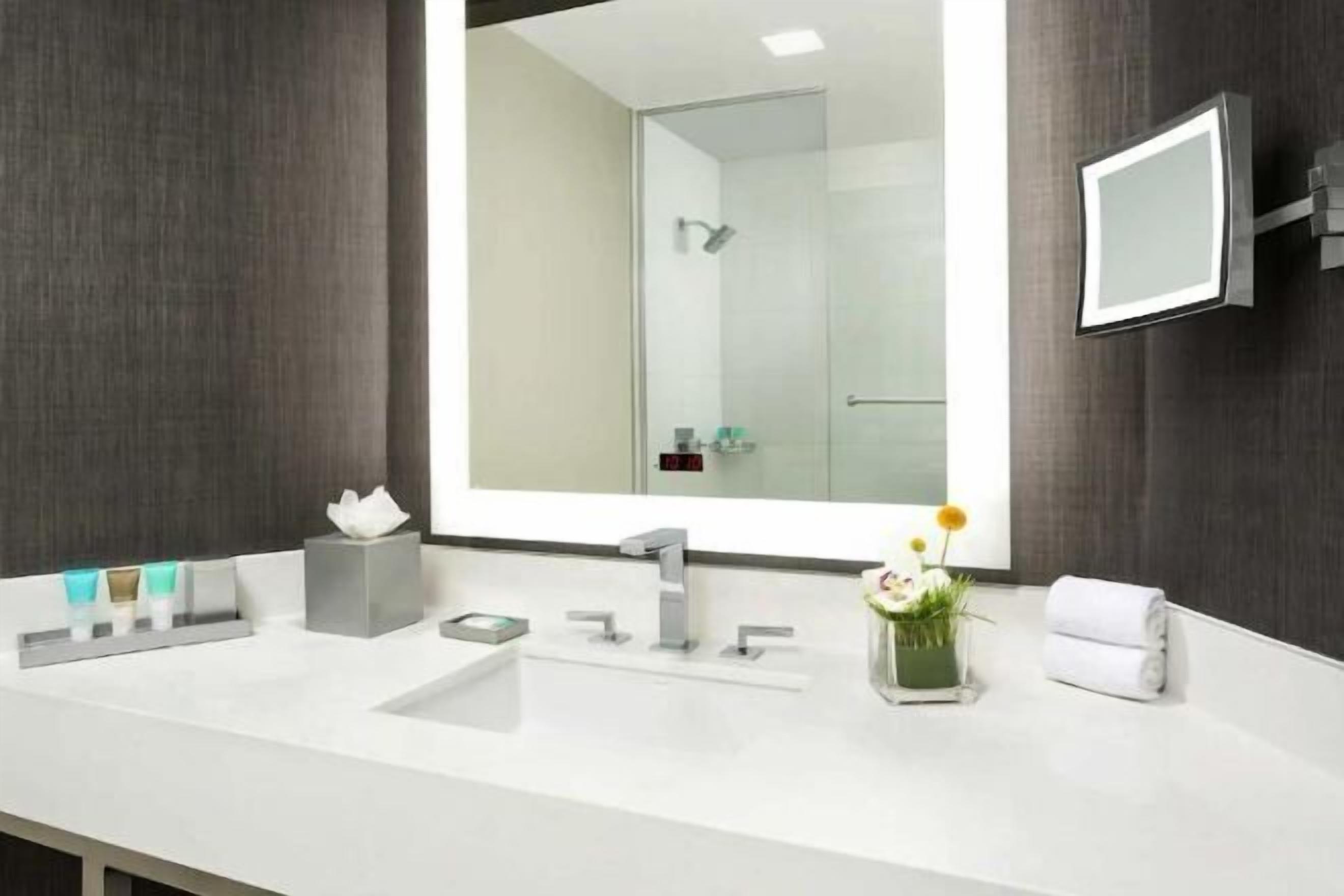 Bathroom | Designer toiletries, hair dryer, towels