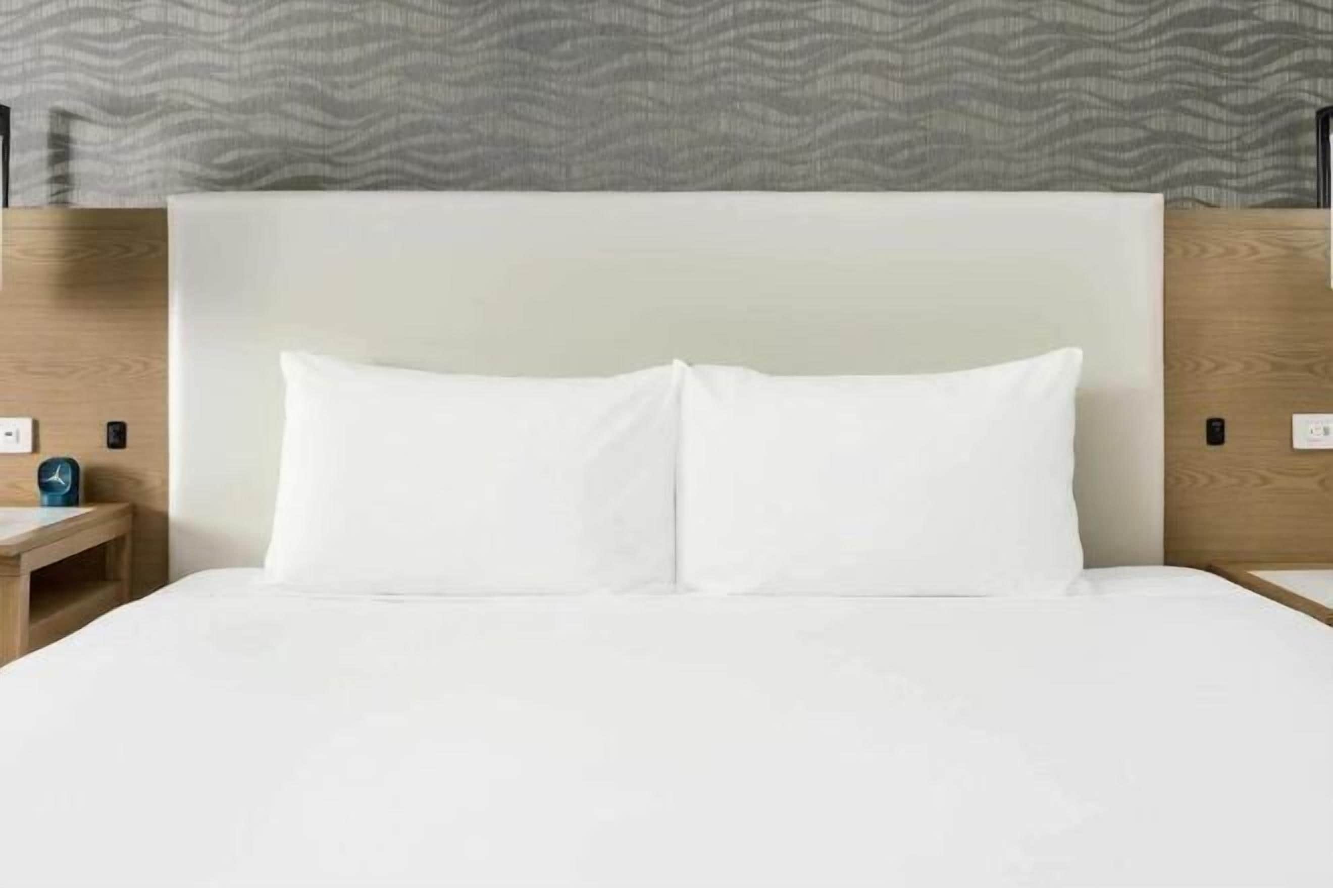 Premium bedding, down comforters, in-room safe, desk