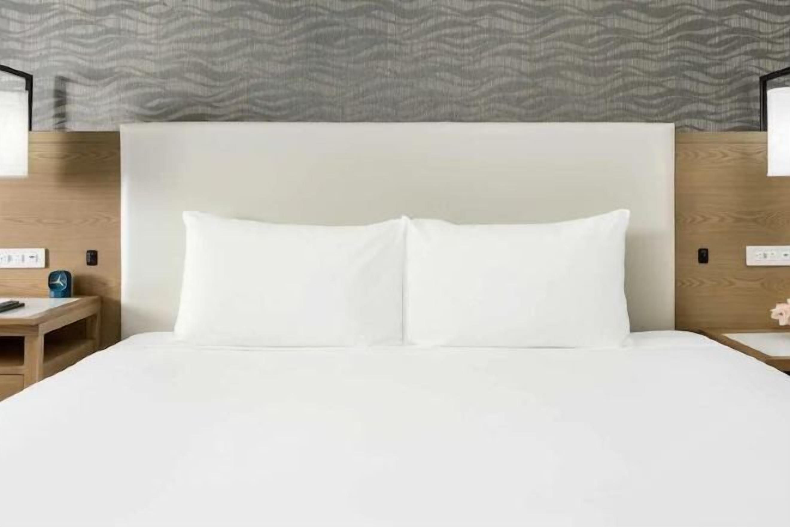 Premium bedding, down comforters, in-room safe, desk