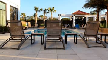 Outdoor pool, open 8:00 AM to 10:00 PM, free cabanas, sun loungers
