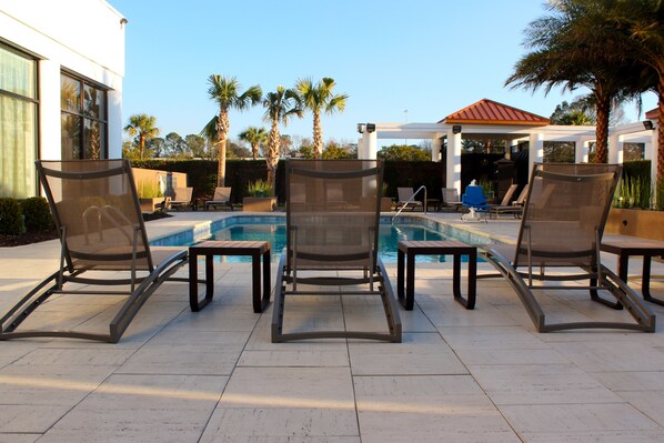 Outdoor pool, open 8:00 AM to 10:00 PM, free pool cabanas, pool loungers