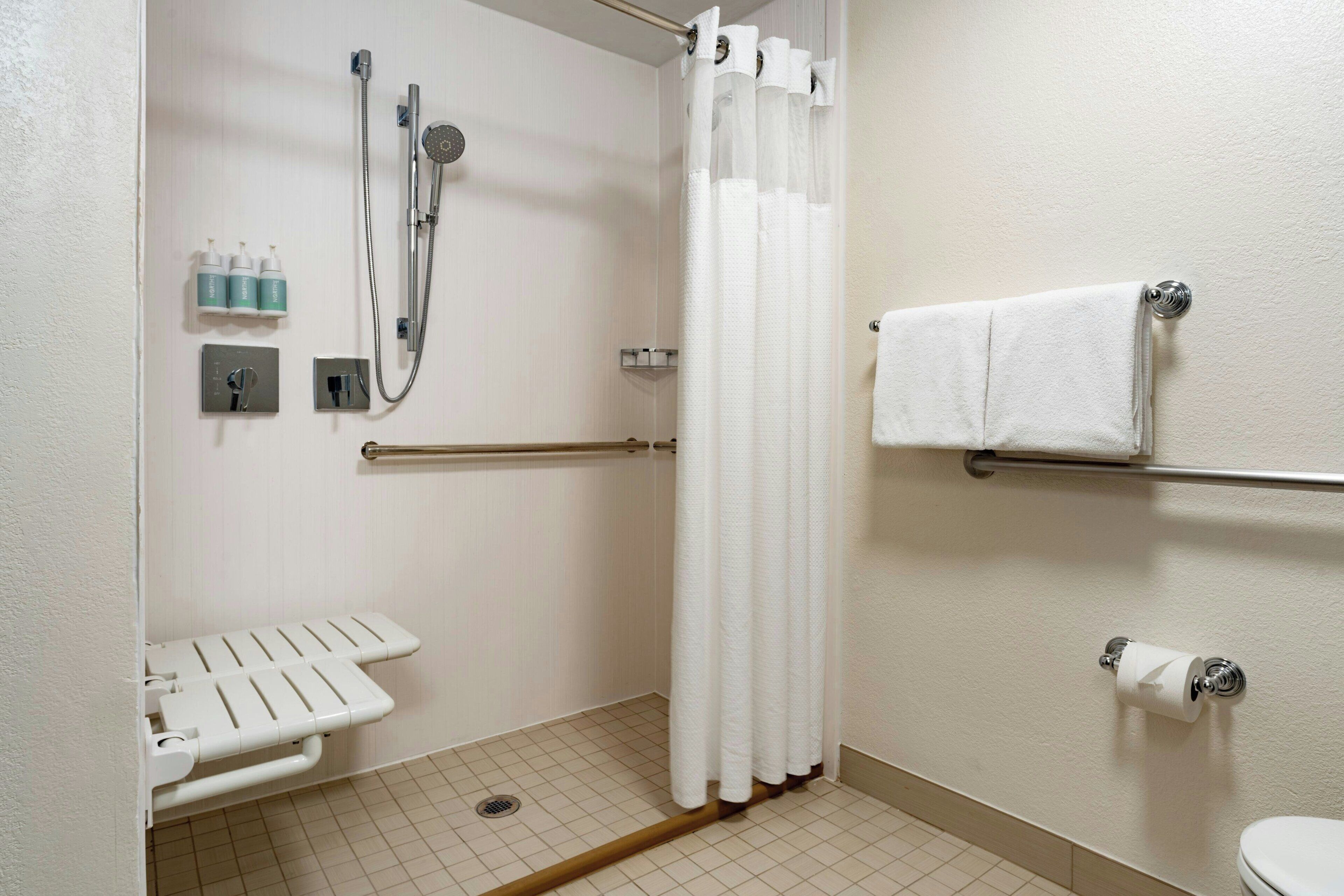 combined shower/bathtub, free toiletries, hair dryer, towels