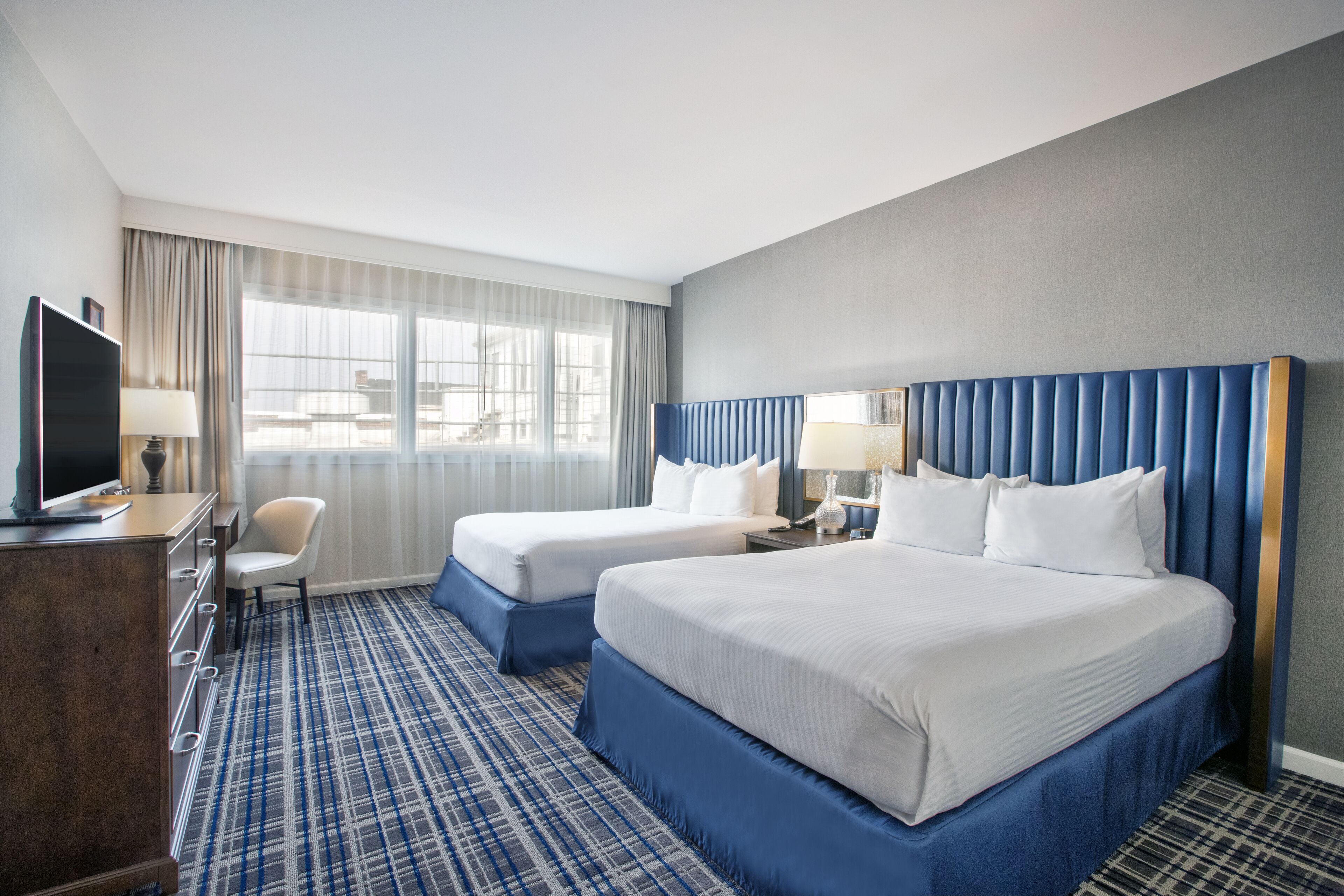 hypo-allergenic bedding, down duvets, in-room safe, desk