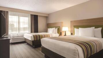 Suite, 1 Bedroom, Non Smoking | Hypo-allergenic bedding, desk, laptop workspace, iron/ironing board