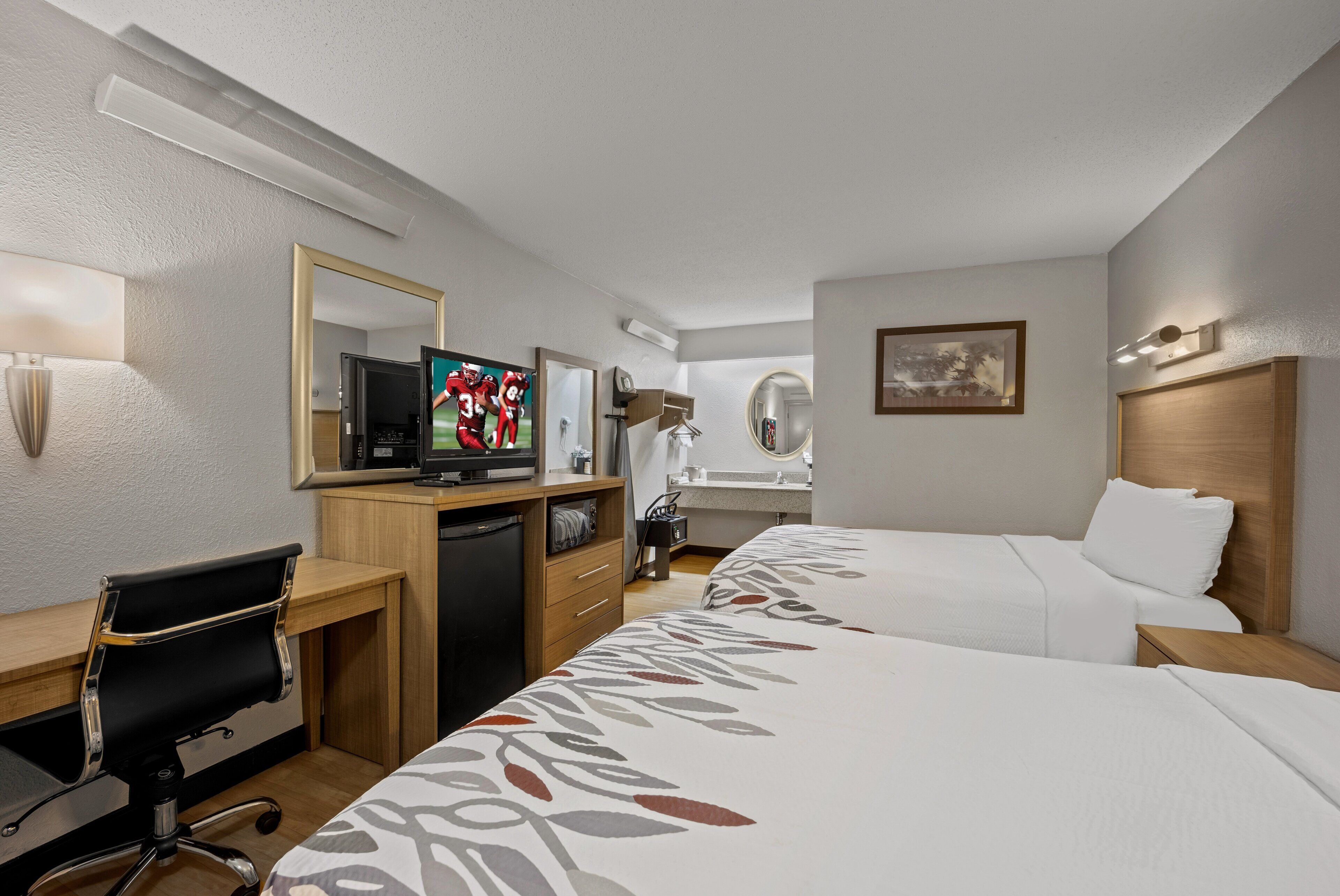 desk, laptop workspace, blackout curtains, free cots/infant beds