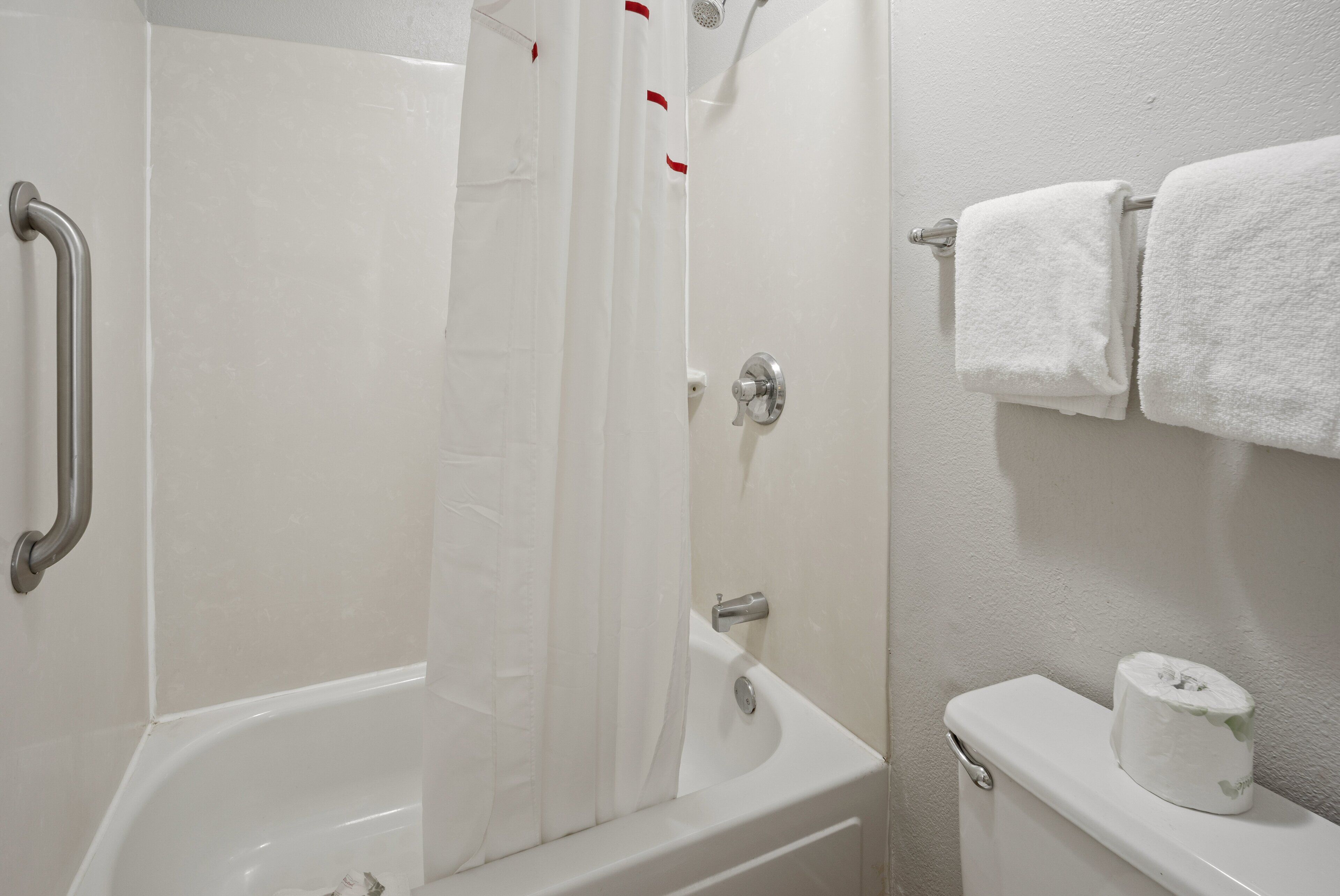 eco-friendly toiletries, hair dryer, towels, soap