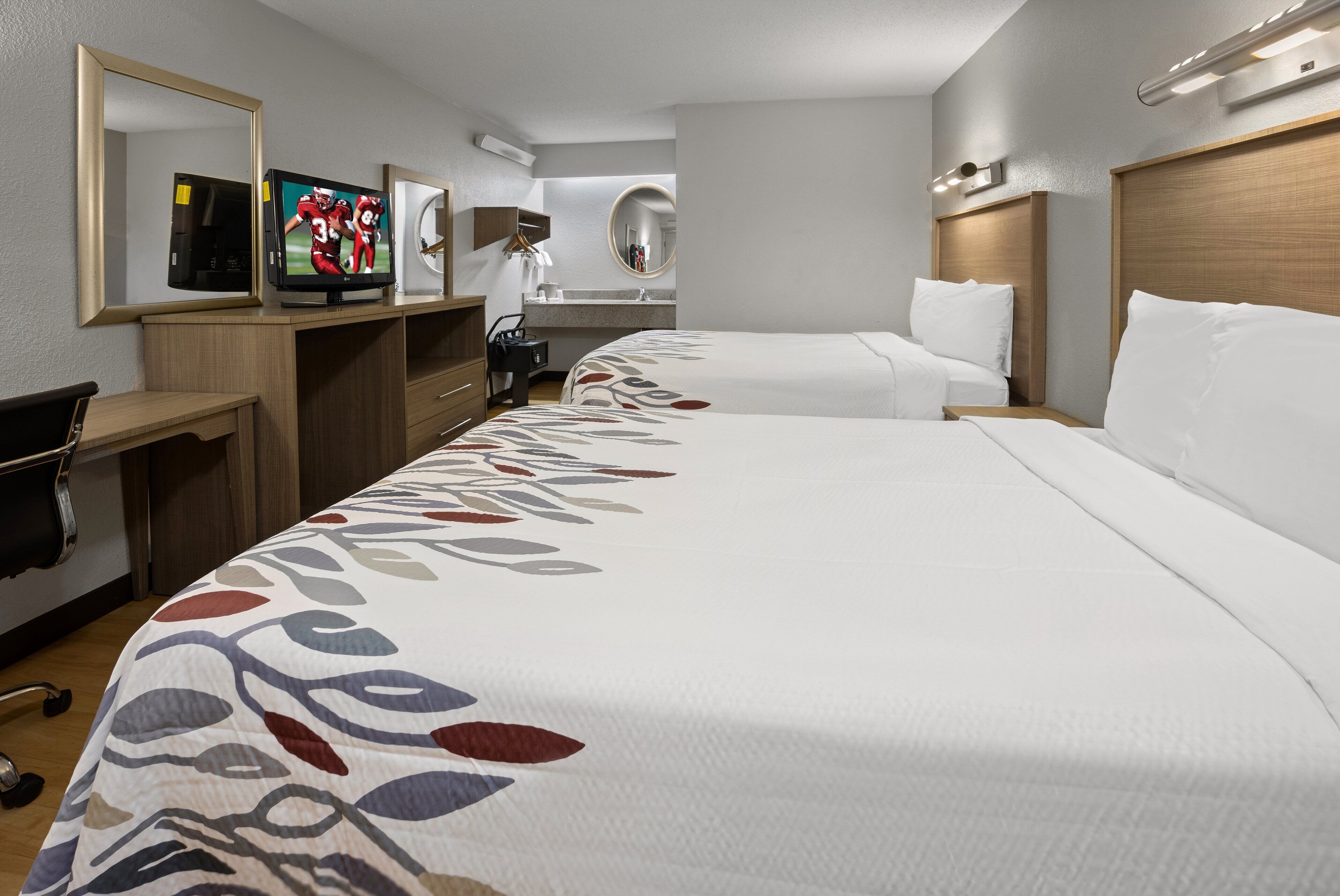 desk, laptop workspace, blackout curtains, free cots/infant beds