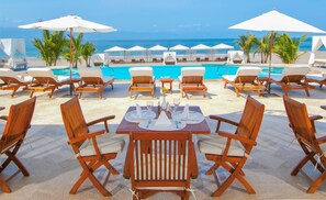 Outdoor pool, free cabanas, pool umbrellas