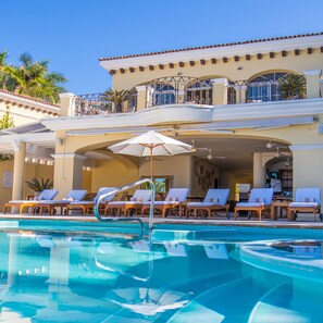 Outdoor pool, free pool cabanas, pool umbrellas