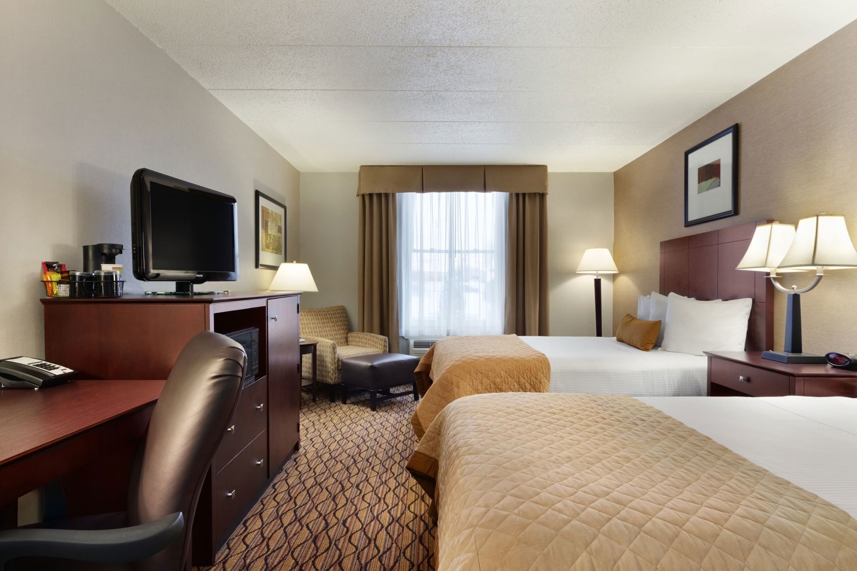 Premium bedding, down duvets, pillow-top beds, in-room safe