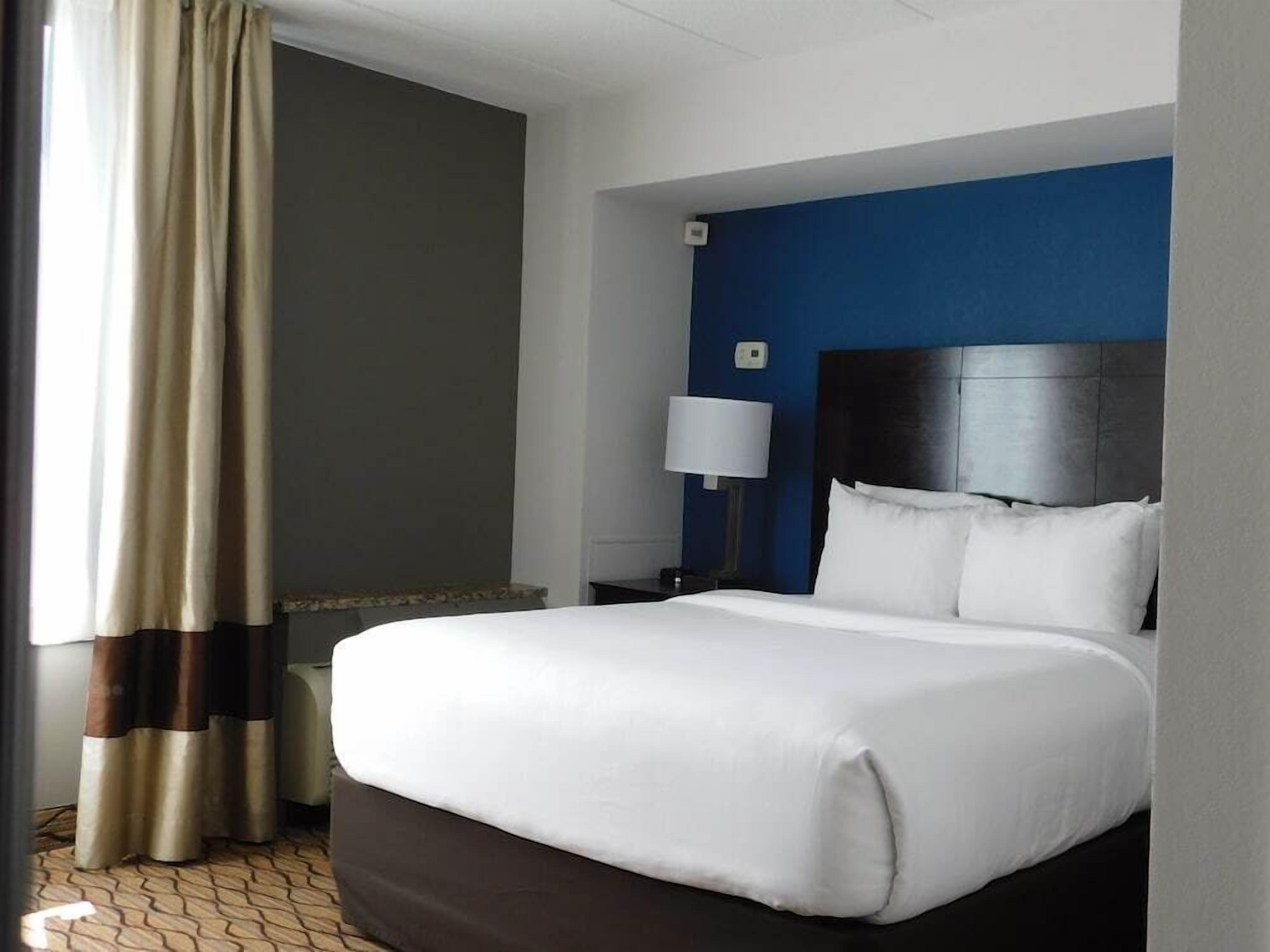 Premium bedding, down duvets, pillow-top beds, in-room safe