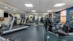 A gym with treadmills, stationary bikes, and weight machines. - Comfort Inn & Suites Glen Mills - West Chester (Glen Mills)